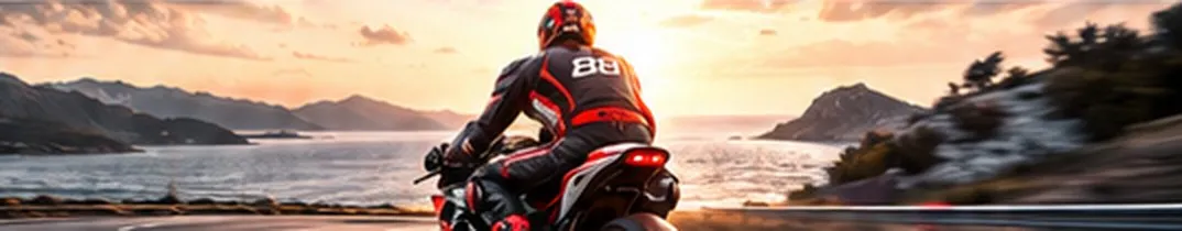 Rider on a coastal road at sunset